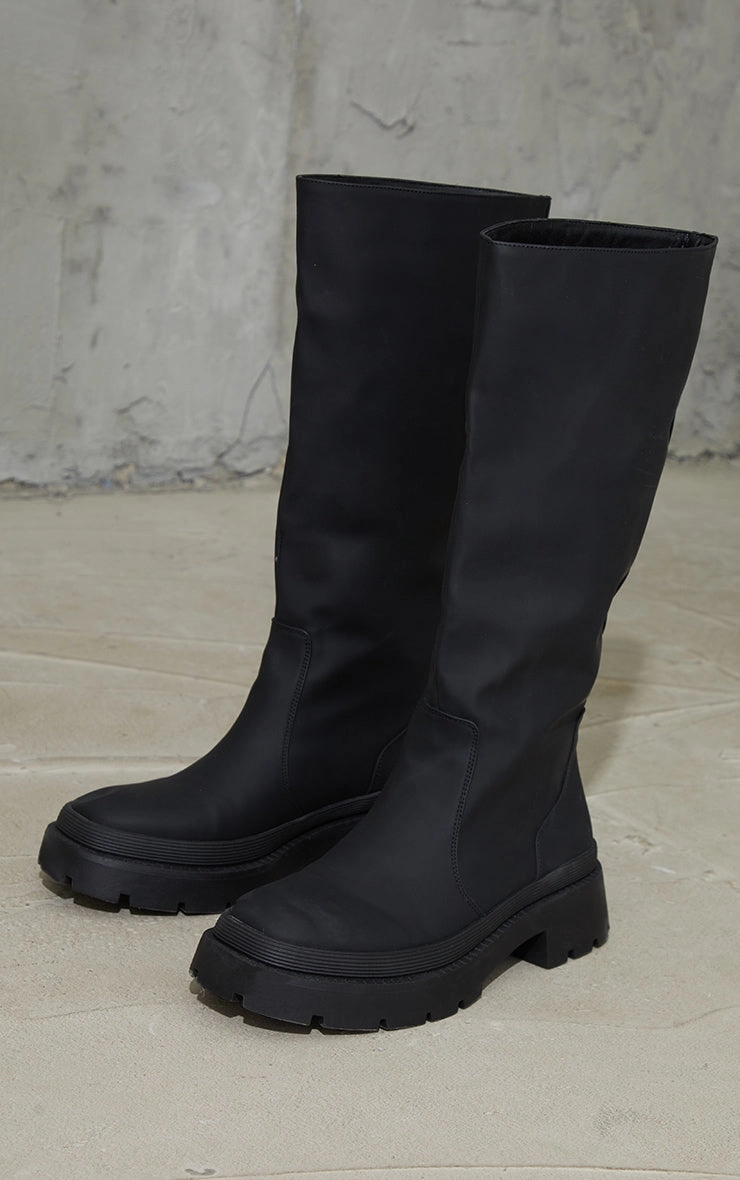 Black Knee High Rubberised Boots Over Knee High Leather Boots